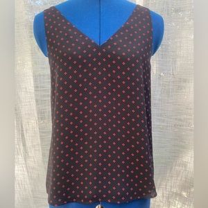 Express flowy top with criss cross lines in back and red black diamond pattern